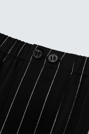 Waistband button design on Galaxy pajama pants with pinstripe detail.