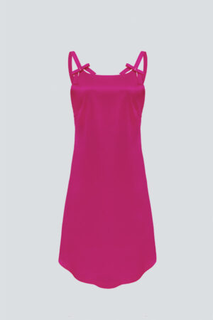 A red short Glitter dress with straps adorned with a bow, offering a sophisticated look.