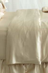 Champagne 22 silk duvet cover offering a touch of elegance and comfort to the bedroom decor.