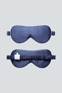 Sleek MANITO HA Silk Eye Mask in navy shown from both sides, offering a soft touch and gentle fit for restful nights.