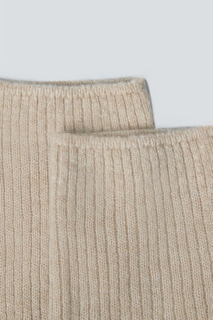 Close-up of top edge detailing on MANITO Heather women's cashmere knit stockings.