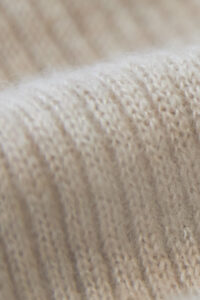 Close-up of knit pattern on MANITO Heather women's knit stockings.