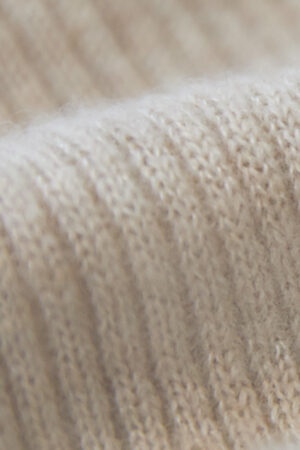 Close-up of knit pattern on MANITO Heather women's knit stockings.