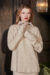 Heather Women's Silk Cashmere Knit Pullover in beige with cozy half-zip collar and soft, fluffy texture.