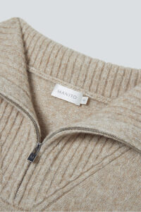 Detailed shot of Heather Women's Silk Cashmere Knit Pullover collar with visible zipper and ribbed knit finish.