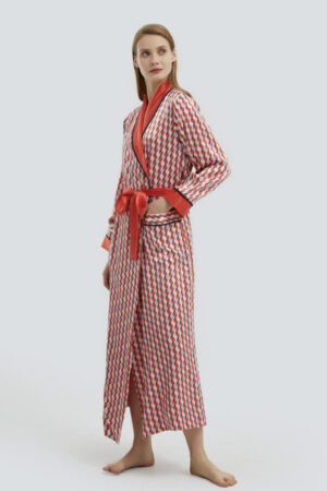 Full-length view of model in Infinite Women's Long Silky Robe with waist tie and geometric design.