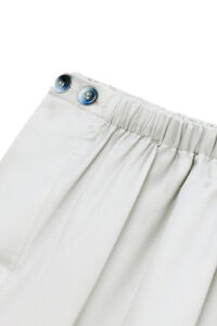 Elastic waistband of Inkmark Men's Pajama Set with blue buttons, offering gentle comfort and ease during restful lounging.