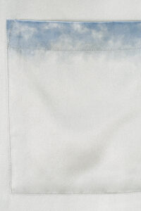Close-up of the pocket design on MANITO Inkmark Men's Short Pajama Set with soft blue gradient trim.