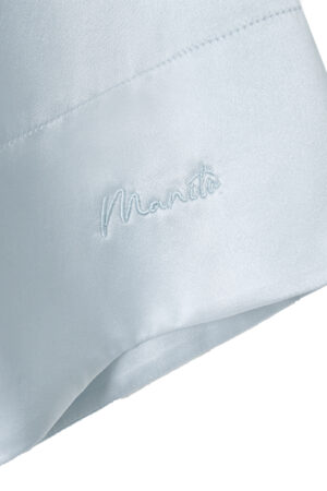 MANITO Jolly Women's Silk Pajamas Set sleeve with subtle embroidered MANITO logo.