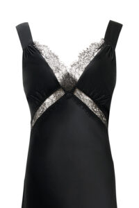 Close-up of Latica Lace Maxi Dress, showing intricate lace details and the diagonal cut-out band.