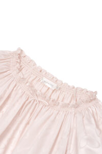 MANITO Loving Silk Nightdress, showcasing its relaxed silhouette and heart-patterned weave.
