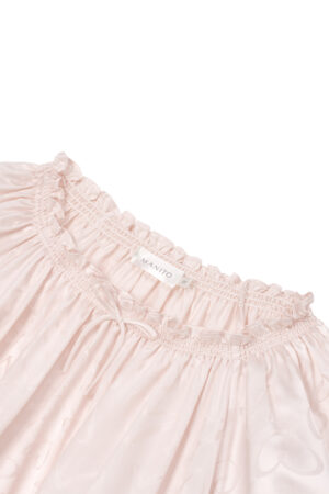 MANITO Loving Silk Nightdress, showcasing its relaxed silhouette and heart-patterned weave.