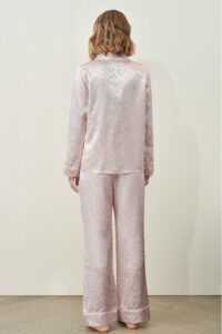 Back view of the full MANITO Loving Women's Pajama Set worn by a model, highlighting the soft drape and romantic design.