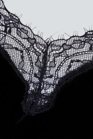 Close-up detail of delicate lace trim on MANITO Luella Silk Velvet Black Nightdress, highlighting intricate craftsmanship.