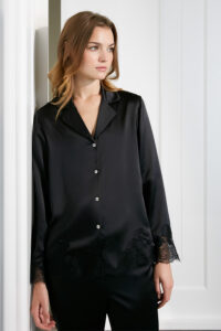 Close-up of Luella Women's Pajama Set in black silk, featuring tonal lace detailing and a soft satin finish.