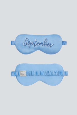 Front and back view of the blue September Lune Silk Eye Mask made from soft mulberry silk.