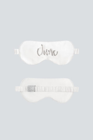 White Lune Silk Eye Mask with “June” sequin embroidery, crafted from soft mulberry silk.