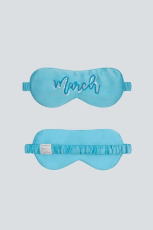 Bright blue March Lune Silk Eye Mask with sequin month name and silk elastic band.
