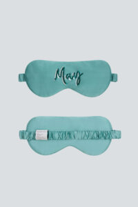 Teal May Lune Silk Eye Mask with green sequin embroidery and smooth silk finish.