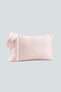 Macaron Silk Pillowcase & Eye Mask Set in blush pink highlighting a soft silk pillowcase and color-matched eye mask.