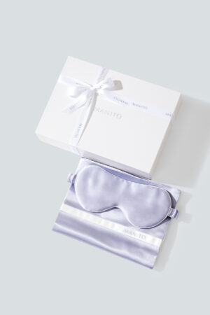 Macaron Silk Pillowcase & Eye Mask Set in lavender shown with MANITO gift box for a luxurious travel gift option.