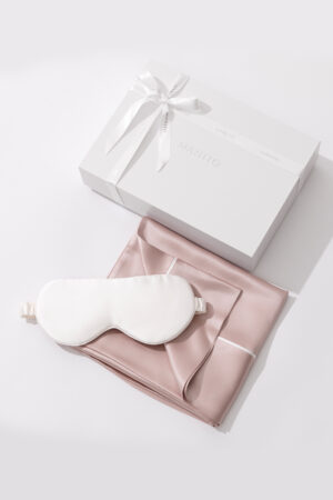Sweet Dreams Silk Pillowcase & Eye Mask Set with pink silk pillowcase, white silk eye mask, and MANITO gift box.