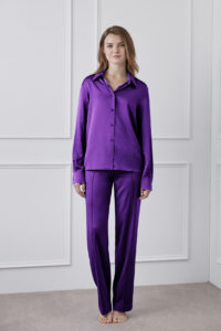 Vibrant Silk Shirt in purple worn by model, highlighting its glossy silk texture.