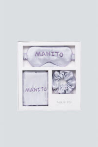 MANITO macaron silk eye mask gift box in purple, elegantly arranged with an eye mask, scrunchie, and pillowcase.