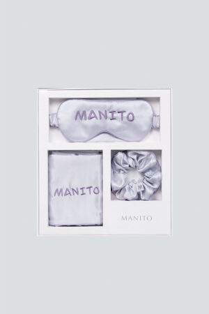 MANITO macaron silk eye mask gift box in purple, elegantly arranged with an eye mask, scrunchie, and pillowcase.