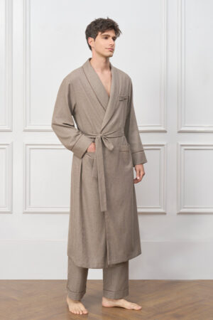 Model wearing the Maple Men's Long Robe, showcasing the earthy brown tone, textured check weave, and relaxed shawl-collar silhouette.