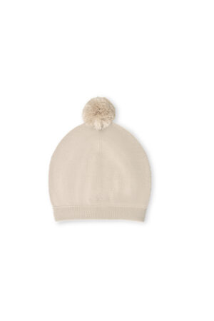 Mellow Baby's knit hat in sand-camel with a soft pompom on top to keep a baby's head warm.