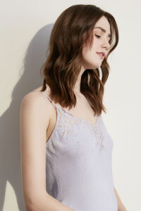 Side view of Monogram Women's Camisole Set showing lace detail and textured silk fabric.