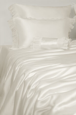Moonlight silk bedding Collection showcases a luminous sheen and soft, flowing texture that invites serene comfort.