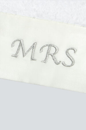 Mr. & Mrs. Bath Towel close-up of MRS embroidery on white silk trim, blending softness and refined elegance.
