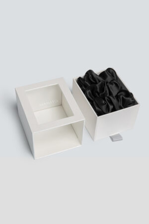 3 Pack Large Silk Scrunchie Set in black, arranged neatly in a gift box, showcasing refined simplicity and smooth silk texture.