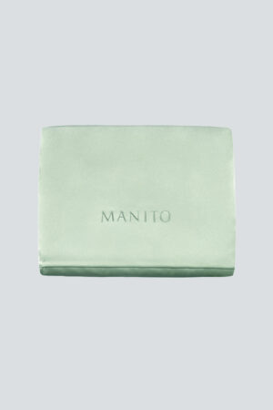 The 22 Silk Pillow Sham Set in soft green, highlighting luxurious comfort and refined style.