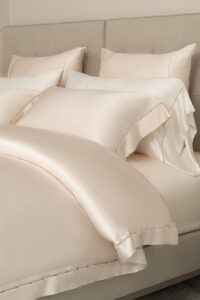 The complete MANITO New Aqua Bedding Sets elegantly displayed on a made bed, highlighting the color and overall aesthetic.