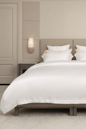 MANITO New Aqua Silk Bedding Set elegantly styled in a sophisticated bedroom.