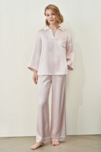 MANITO new authentic women's polo shirt pajama set modeled by a person in a relaxed, casual pose from a front angle.