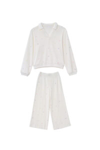 New Signature Children's Knit Pajama Set in white, featuring a collared V-neck top and pants with rainbow letters for cozy lounging.