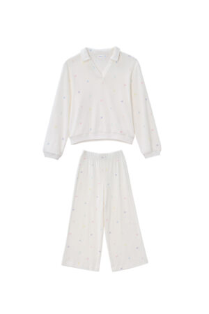 New Signature Children's Knit Pajama Set in white, featuring a collared V-neck top and pants with rainbow letters for cozy lounging.