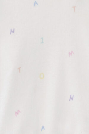 Pattern close-up of New Signature Children's Knit Pajama Set, with rainbow letters scattered across for a cheerful look.