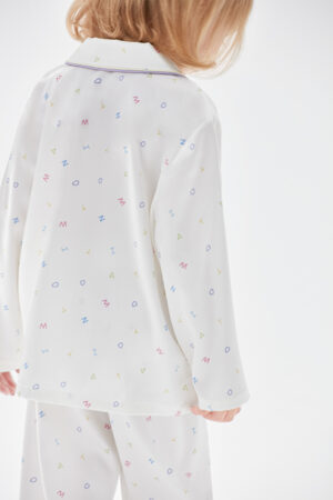 Back view of New Signature Kid's Pajama Set showing colorful alphabet print on silk fabric.