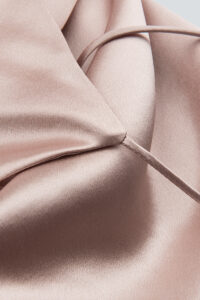Blush pink silk fabric detail from MANITO Women's Camisole Set showing luxurious softness.