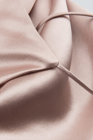 Blush pink silk fabric detail from MANITO Women's Camisole Set showing luxurious softness.