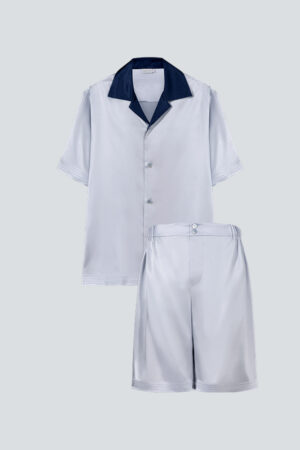 Flat lay of silver gray MANITO Sketchy Men's Pajama Set with navy lapel contrast.