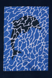 Close-up of dolphin print panel on the back of the MANITO Ocean Blue Dolphin Men's Pajama Set.