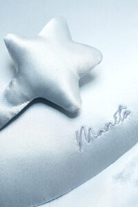 Side profile of the manta ray-shaped best MANITO Ocean Blue Pillow for kids, highlighting its sleek contours and soft texture.