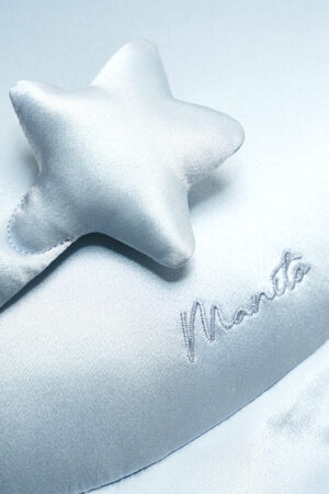 Side profile of the manta ray-shaped best MANITO Ocean Blue Pillow for kids, highlighting its sleek contours and soft texture.