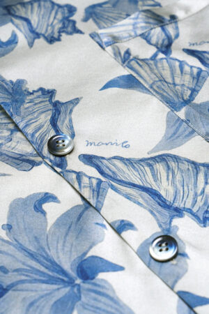 Detail shot of the color-gradient buttons on MANITO Ocean Blue Men's Pajama top.